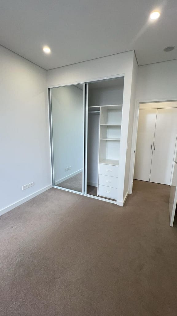 Completed wardrobe installation showcasing expert craftsmanship and attention to detail.